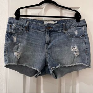 Torrid destructed denim shortie shorts.